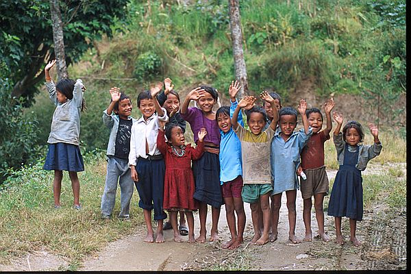 kids%20waving%20tibet%20village_std.jpg